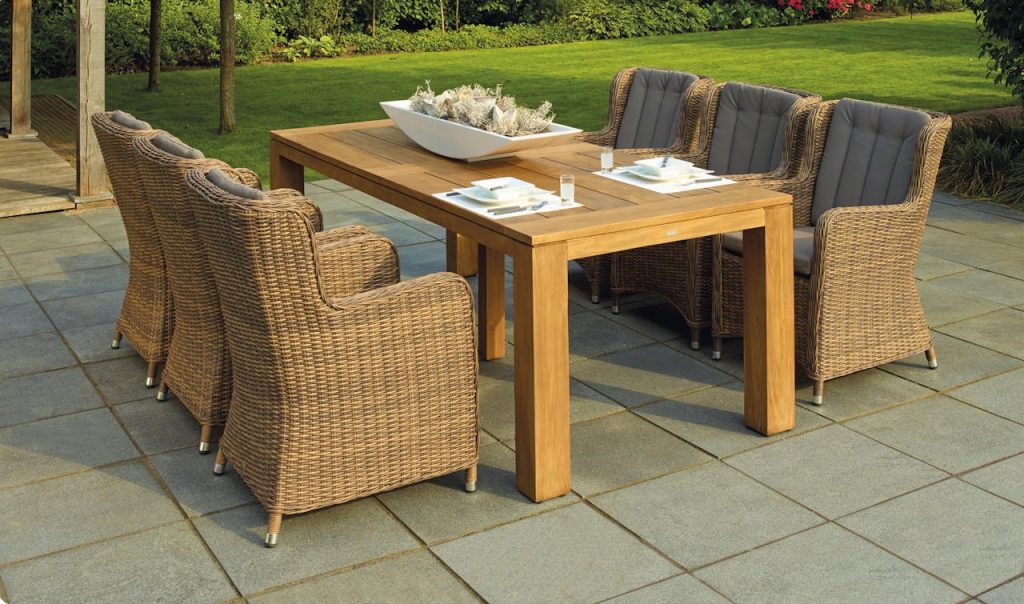 Crafting Captivating Headlines: Your awesome post title goes here A serene outdoor patio set up with rattan chairs and a wooden table, perfect for relaxation.